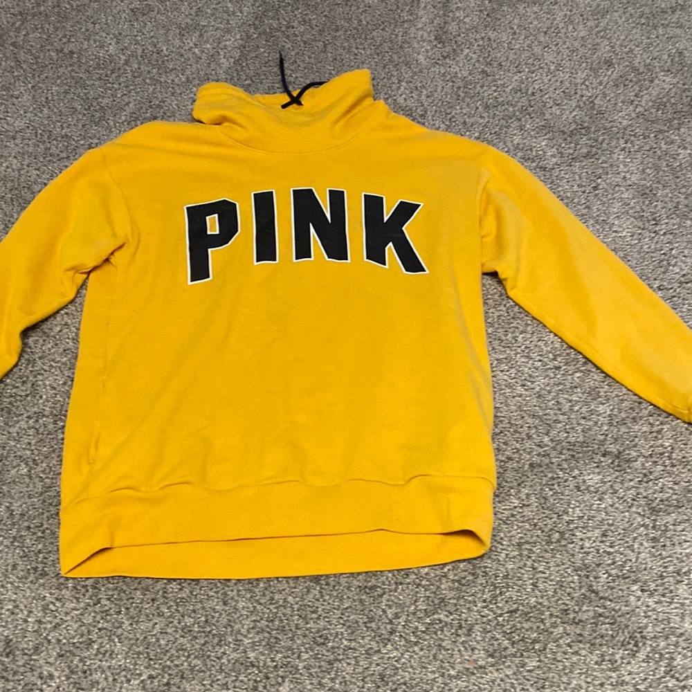 Good condition PINK sweatshirt. Small hole on sleeve.